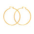 A pair of Big 5.4 cm Hoop Earrings in 14k gold-filled with a thickness of 2 mm and simple clasps. These statement pieces elegantly overlap against a plain white background.